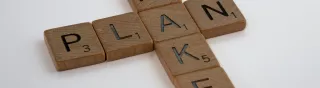 Tiles spelling out PLAN and MAKE